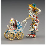 A Three Piece Tiffany & Co. Silver and Enamel Circus Clown Mother and Baby in Carriage