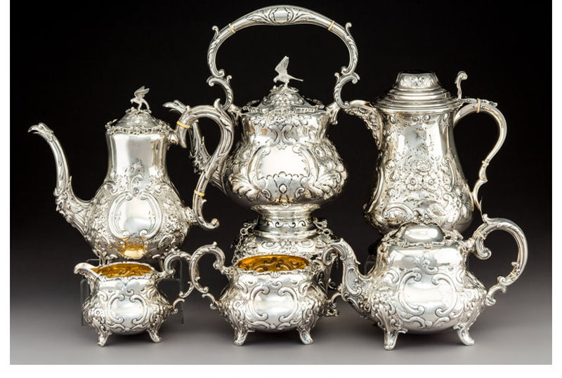 An Assembled Five-Piece English Partial Gilt Silver and Repoussé Tea and Coffee Service with Bird-Form Finials, London and Sheffield, 1867-1909