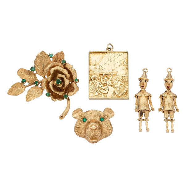 Emerald, Gold Brooches and Charms